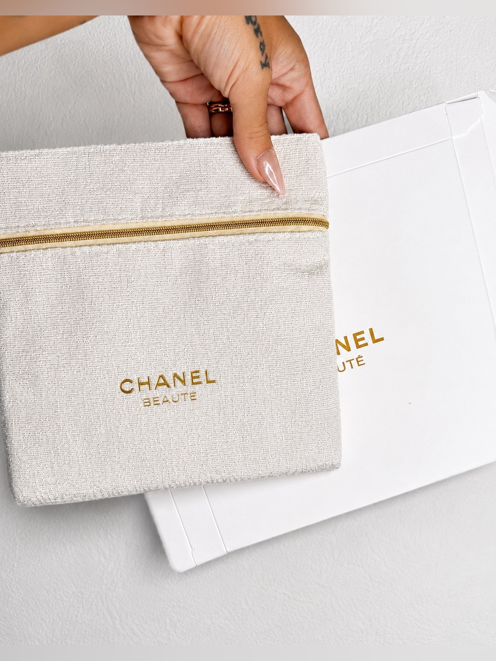 CHANEL Beige Textured Beauté Cosmetic Pouch with Gold Logo